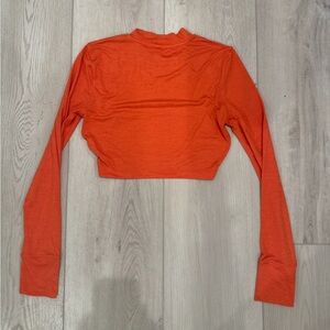 Vuori Vibrant Orange Long Sleeve Crop Top